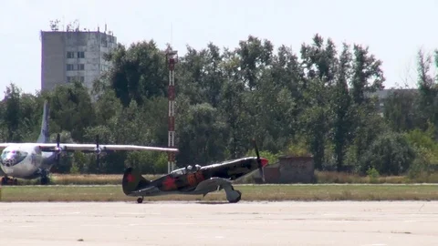Soviet MiG-3 fighter does not move along runway after landing. Retro aviation. Stock Footage 120804011