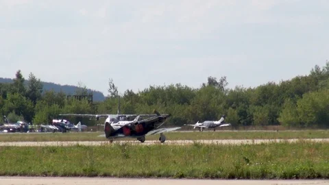Soviet MiG-3 fighter does not move along runway after landing. Retro aviation. Stock Footage 120804027