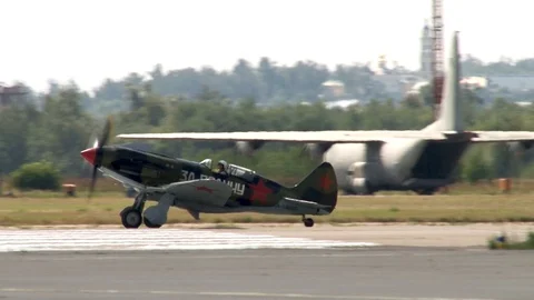 Soviet MiG-3 fighter is heading along taxiway towards runway. Stock Footage 117541892
