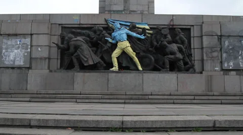 Soviet monument in Sofia painted in colours of Ukraine Stock Footage 35527544