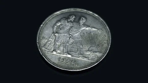 Soviet old rare coin 1 ruble 1924 of release rotates on a black background Stock Footage 121605805