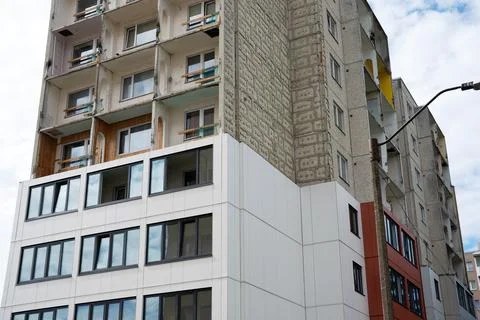 Soviet panel apartment building undergoing modern renovation. 写真素材