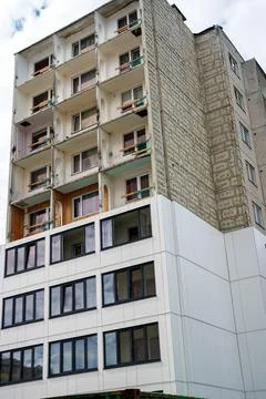 Soviet panel apartment building undergoing modern renovation. 写真素材