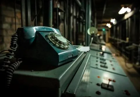 Soviet phone on a huge control panel in a theater. Stock Photos