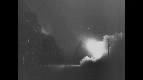 Soviet rockets fire as buildings burn during Berlin street fighting Stock Footage 103382371
