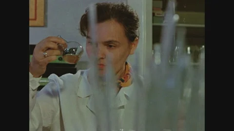 Soviet scientists work in the laboratory Stock Footage 246821062