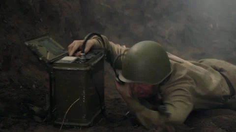 Soviet soldier during combat action crawls to portable radio. Stock Footage 65960436