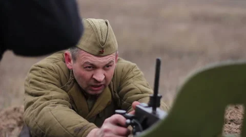 Soviet soldier taking aim for a machine ... | Stock Video | Pond5