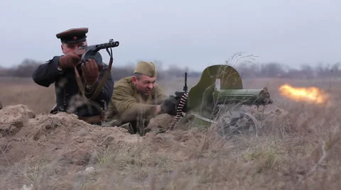 Soviet soldiers shooting at the enemy. WW2 reconstruction Stock Footage 47076975