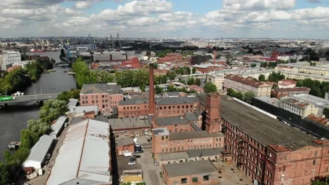 Soviet Star factory red bricks Saint-Petersburg. Sea port in background. aerial Видео 167686202