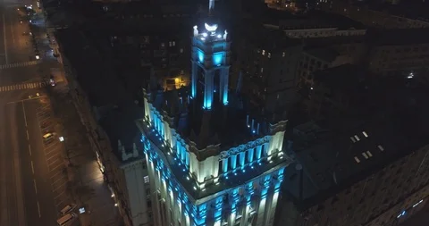 Soviet star with lights at night on top of the building. Kharkiv, Ukraine Stock Footage 93847806