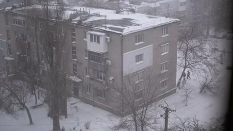 Soviet-Style Apartment Block During a Winter Blizzard Stock Footage 327646166