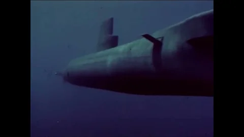 Soviet submarines, missiles launching, warplanes, helicopters and warships are Stock Footage