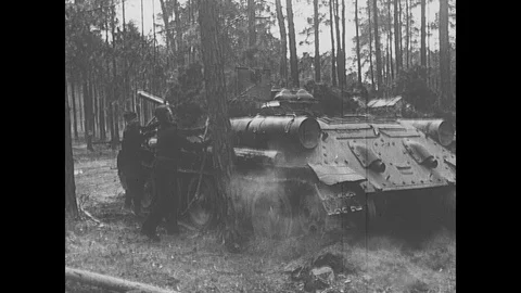 Soviet troops use smoke and branches to cover their advance Stock Footage 103381872