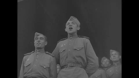 SOVIET UNION - 1944: Base Concert Night - Aircrew Pose Among Fellow Airmen 库存影片 343997433