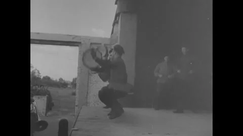 SOVIET UNION - 1944: Base Concert Night - Performer Strikes A Frame Drum Stock Footage 343997451