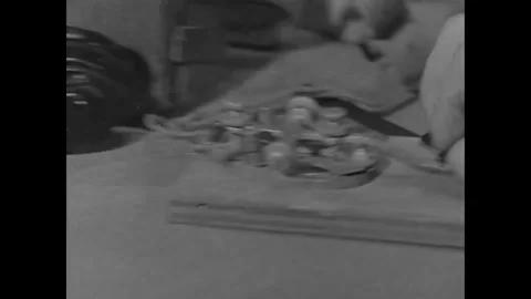 SOVIET UNION - 1944: Shuttle Bombing Op - Hands Assemble Mechanical Hardware Stock-Footage 343997482