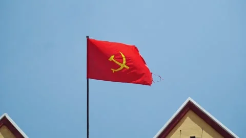 Soviet Union flag waving on flagpole in front of institutional building Stock Footage 340022874
