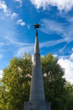 Soviet war memorial in a cemetery. Stock Photos