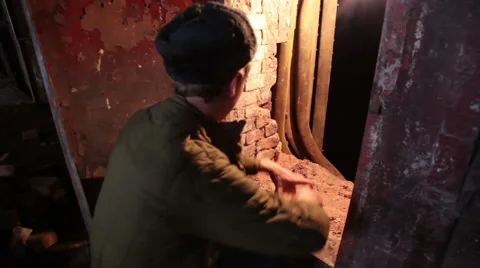 Soviet worker laying brick oven Stock Footage 51544361