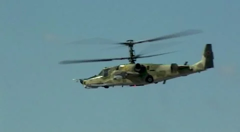 Soviet/Russian attack helicopter Ka-50 "Black Shark"performs aerobatics. Stock Footage 196152662
