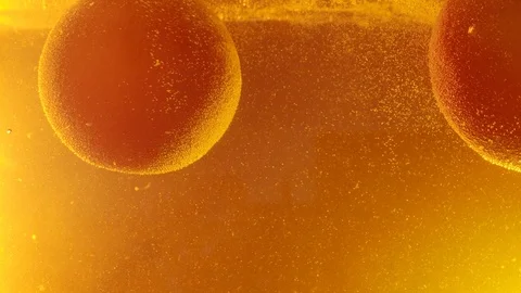 Sow motion of pouring orange fall into the juice. Ver 2 Stock Footage 121691489