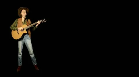 Сowboy with guitar Stock Footage 12726474