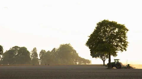 Sower machine implement cereal grain seeds in soil. Static shot. 4K Stock Footage 108769841
