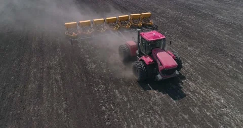 Sowing. A big tractor sows a crop. Stock Footage 160546334