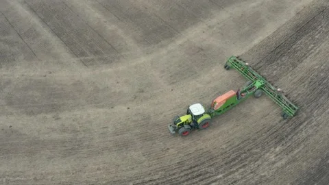 Sowing complex work in the field in spring. Aerial photography Stock Footage 151496297