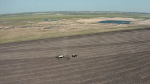 Sowing complex work in the fields in spring. Aerial photography Видео 151496316