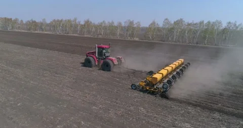 Sowing. A farmer on a tractor sows a crop. Stock Footage 160544448