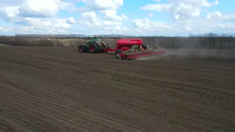 Sowing machinery in the field during spring work. Stock Footage 154165829