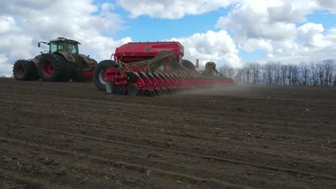 Sowing machinery in the field during spring work. Stock Footage 154165835