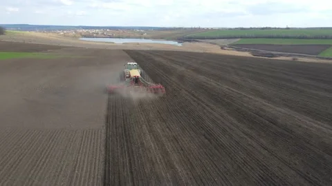 Sowing machinery in the field during spring work. Stock Footage 154165842