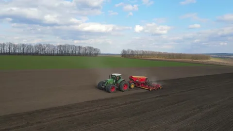 Sowing machinery in the field during spring work. Stock Footage 154165854