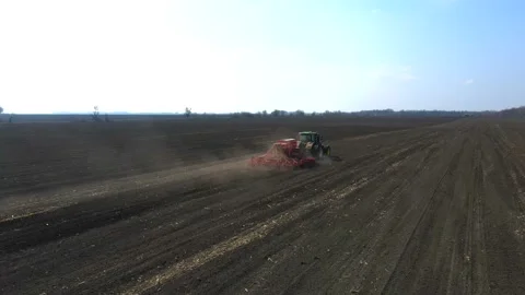 Sowing machinery in the field during spring work. Stock Footage 154165855