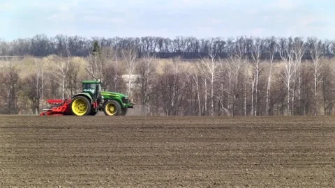 Sowing machinery in the field during spring work. Stock Footage 154165869