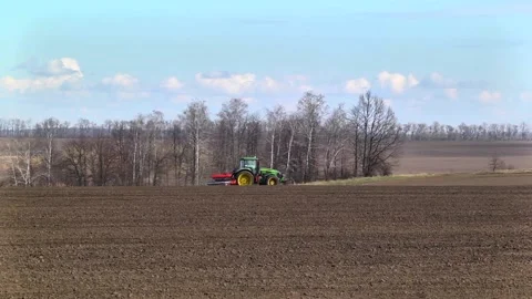 Sowing machinery in the field during spring work. Stock Footage 154165874