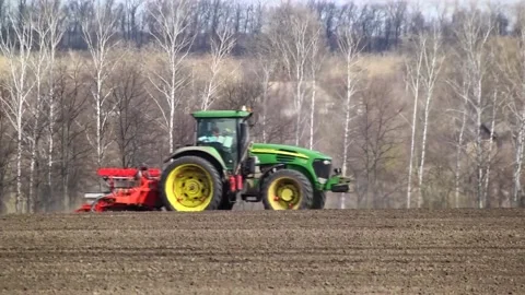 Sowing machinery in the field during spring work. Stock Footage 154165877