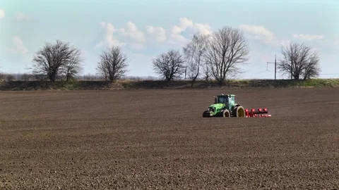 Sowing machinery in the field during spring work. Stock Footage 154165887