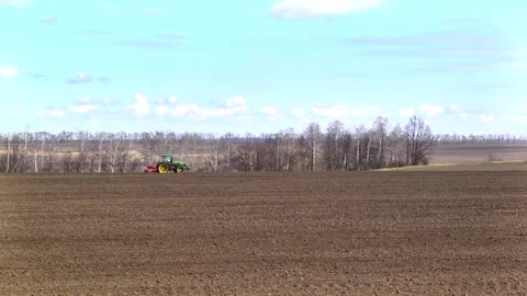 Sowing machinery in the field during spring work. Stock Footage 154165889