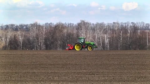 Sowing machinery in the field during spring work. Stock Footage 154165890