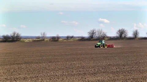 Sowing machinery in the field during spring work. Stock Footage 154165891