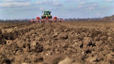 Sowing machinery in the field during spring work. Stock Footage 154165905