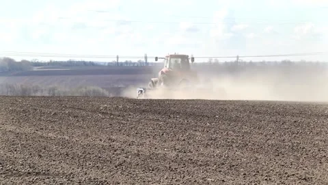 Sowing machinery in the field during spring work. Stock Footage 154165907