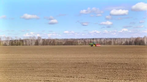 Sowing machinery in the field during spring work. Stock Footage 154165909