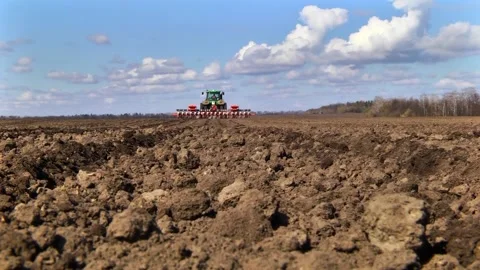 Sowing machinery in the field during spring work. Stock Footage 154165913