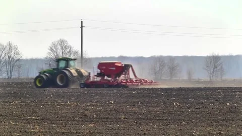 Sowing machinery in the field during spring work. Stock Footage 154165931