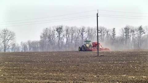 Sowing machinery in the field during spring work. Stock Footage 154165933